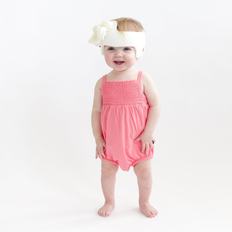 Smocked Bubble Romper in Guava